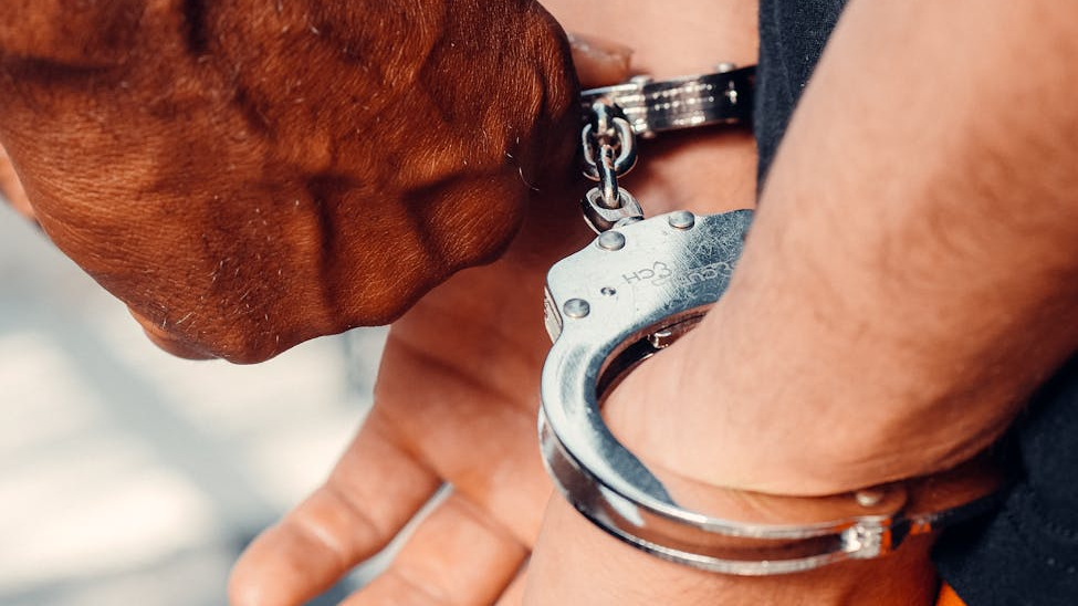 a person in handcuffs